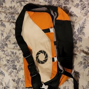 Aperture Laboratories messenger bag.